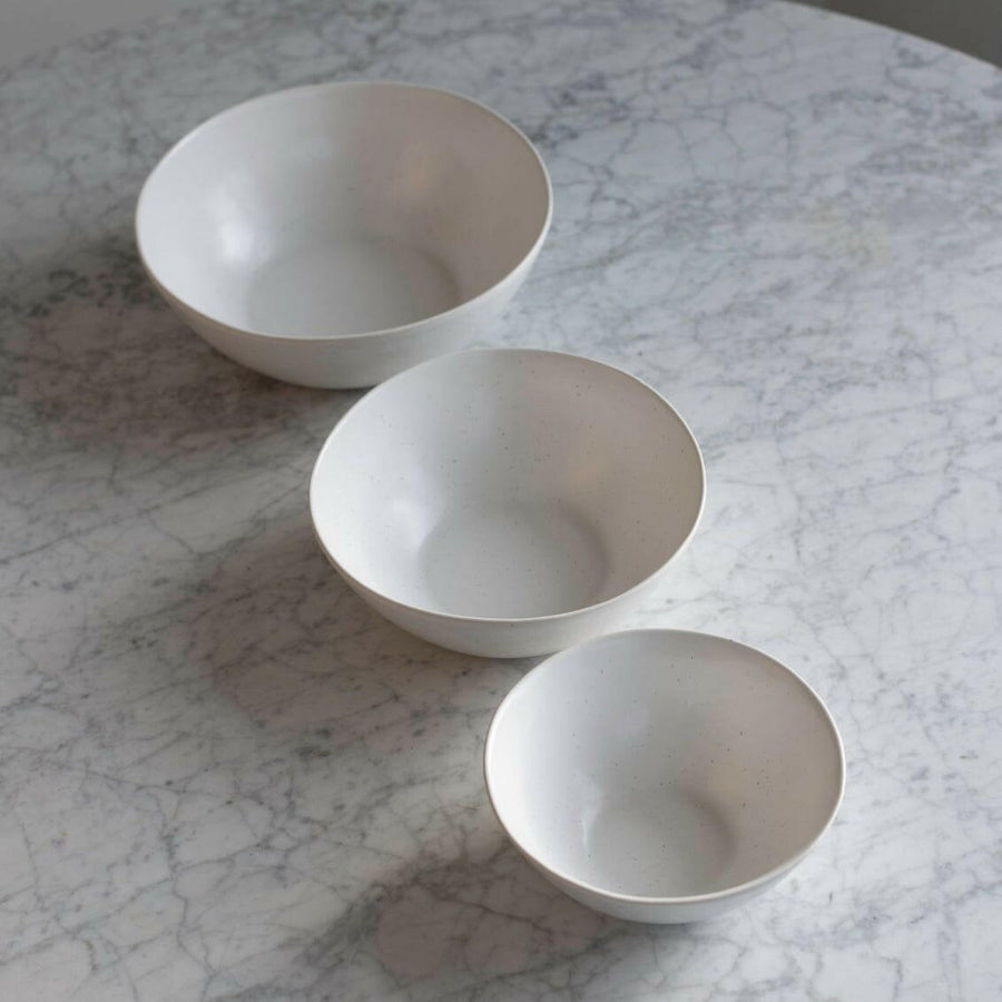 Nested serving trays elegantly arranged, showcasing functionality and style for sophisticated dining experiences.