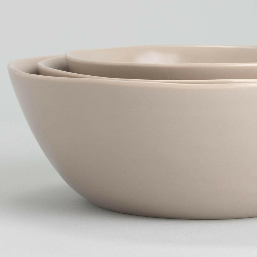 Nested serving trays elegantly arranged, showcasing functionality and style for sophisticated dining experiences.