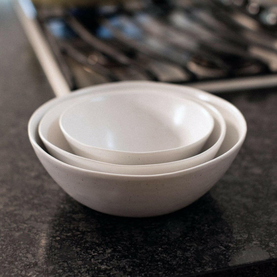 Nested serving trays elegantly arranged, showcasing functionality and style for sophisticated dining experiences.