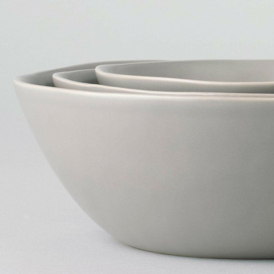 Nested serving trays elegantly arranged, showcasing functionality and style for sophisticated dining experiences.