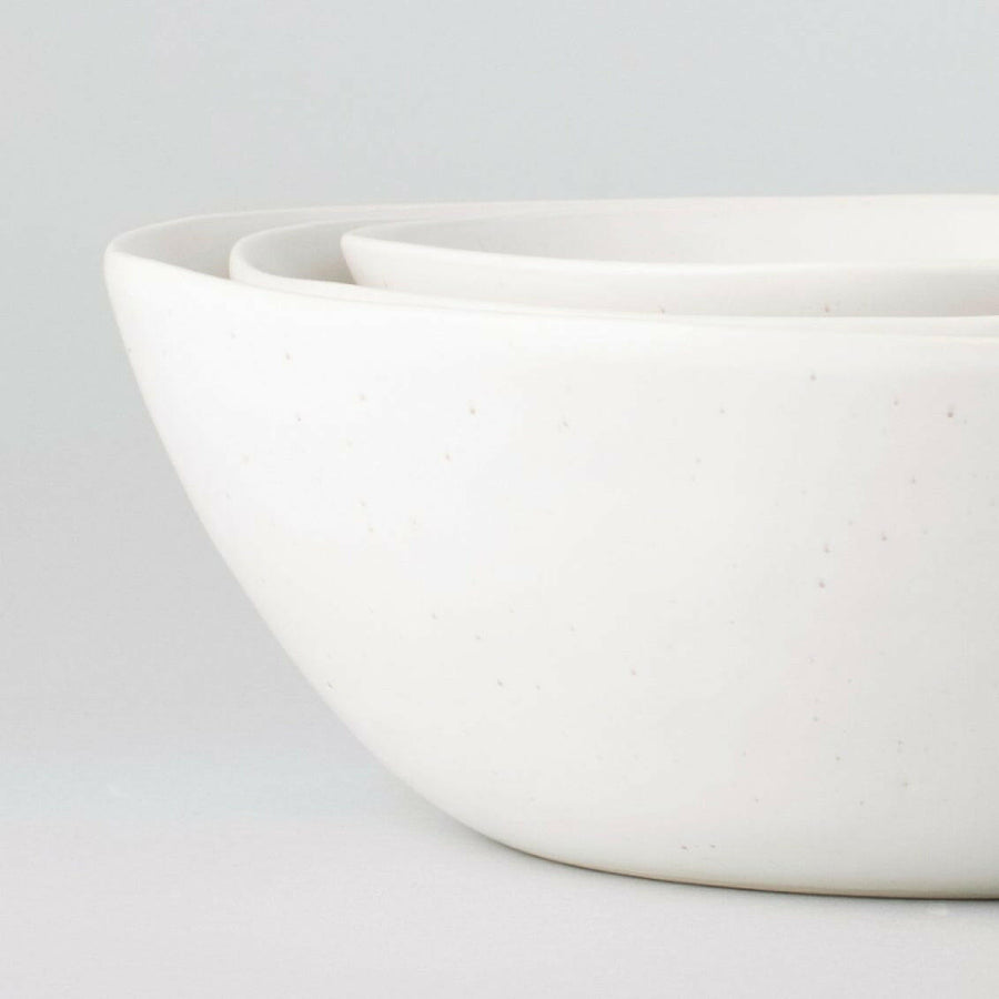 Nested serving trays elegantly arranged, showcasing functionality and style for sophisticated dining experiences.