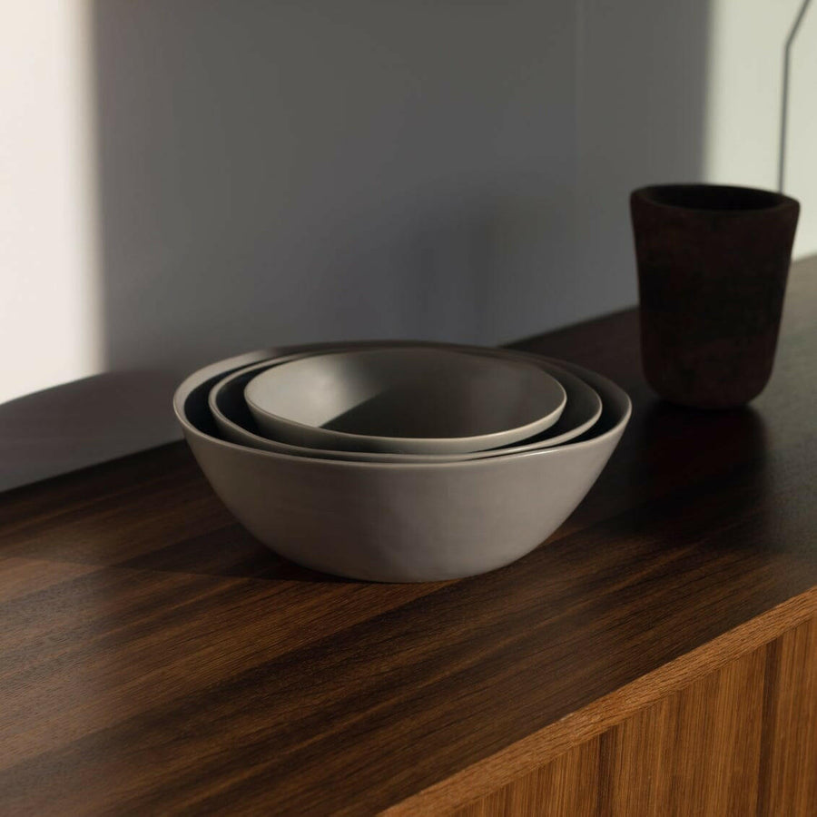 Nested serving trays elegantly arranged, showcasing functionality and style for sophisticated dining experiences.