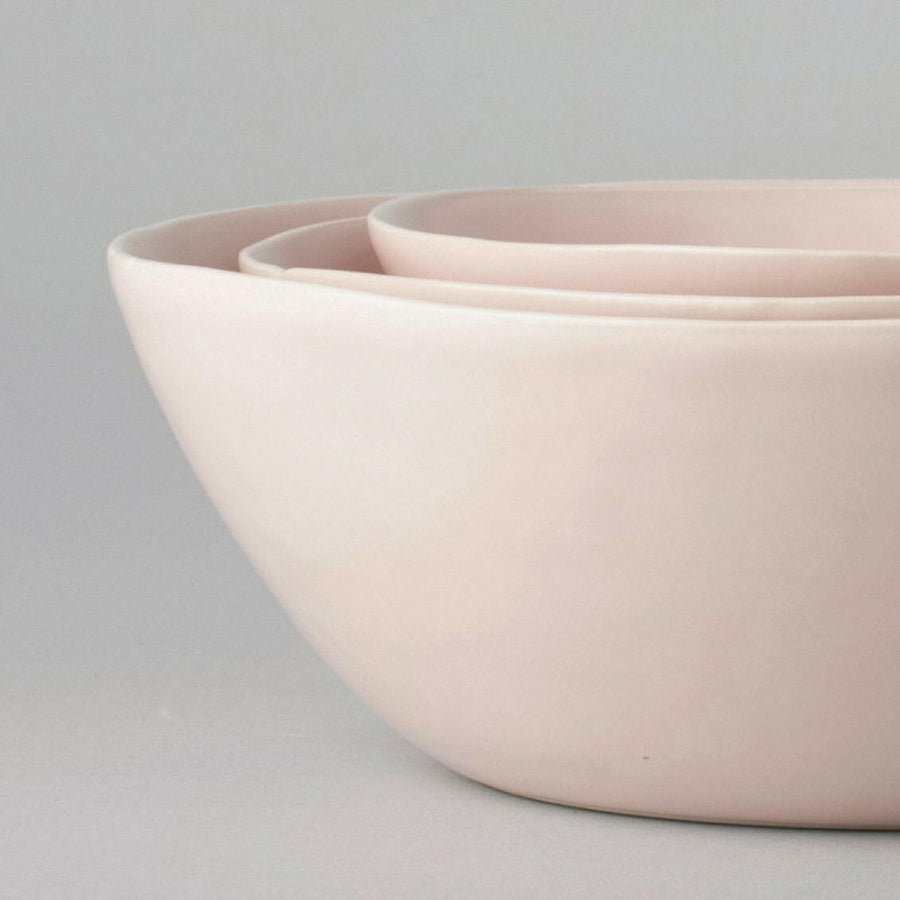 Nested serving trays elegantly arranged, showcasing functionality and style for sophisticated dining experiences.