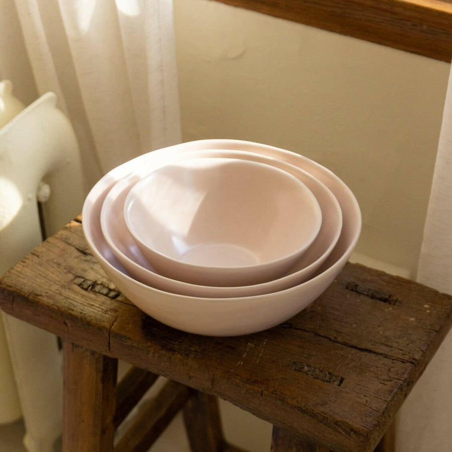 Nested serving trays elegantly arranged, showcasing functionality and style for sophisticated dining experiences.