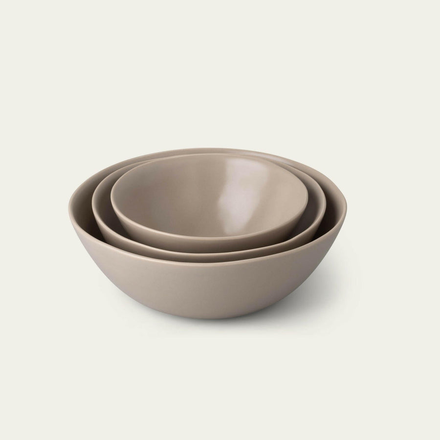 Nested serving trays elegantly arranged, showcasing functionality and style for sophisticated dining experiences.