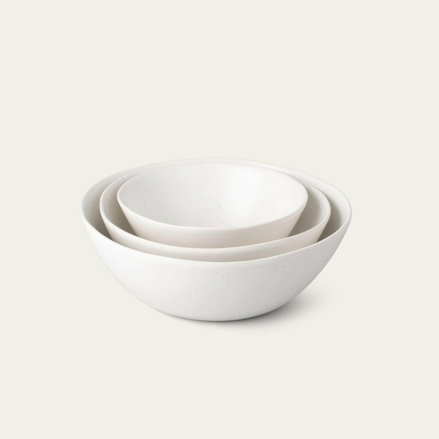 Nested serving trays elegantly arranged, showcasing functionality and style for sophisticated dining experiences.