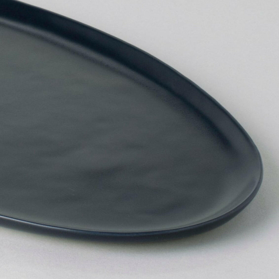 Elegant serving platter showcasing an exquisite arrangement for formal dining occasions, enhancing culinary presentation.