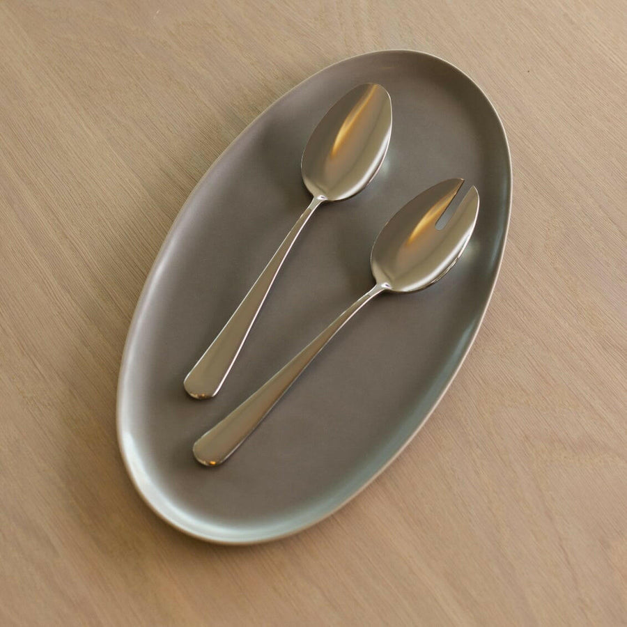 Elegant serving platter showcasing an exquisite arrangement for formal dining occasions, enhancing culinary presentation.
