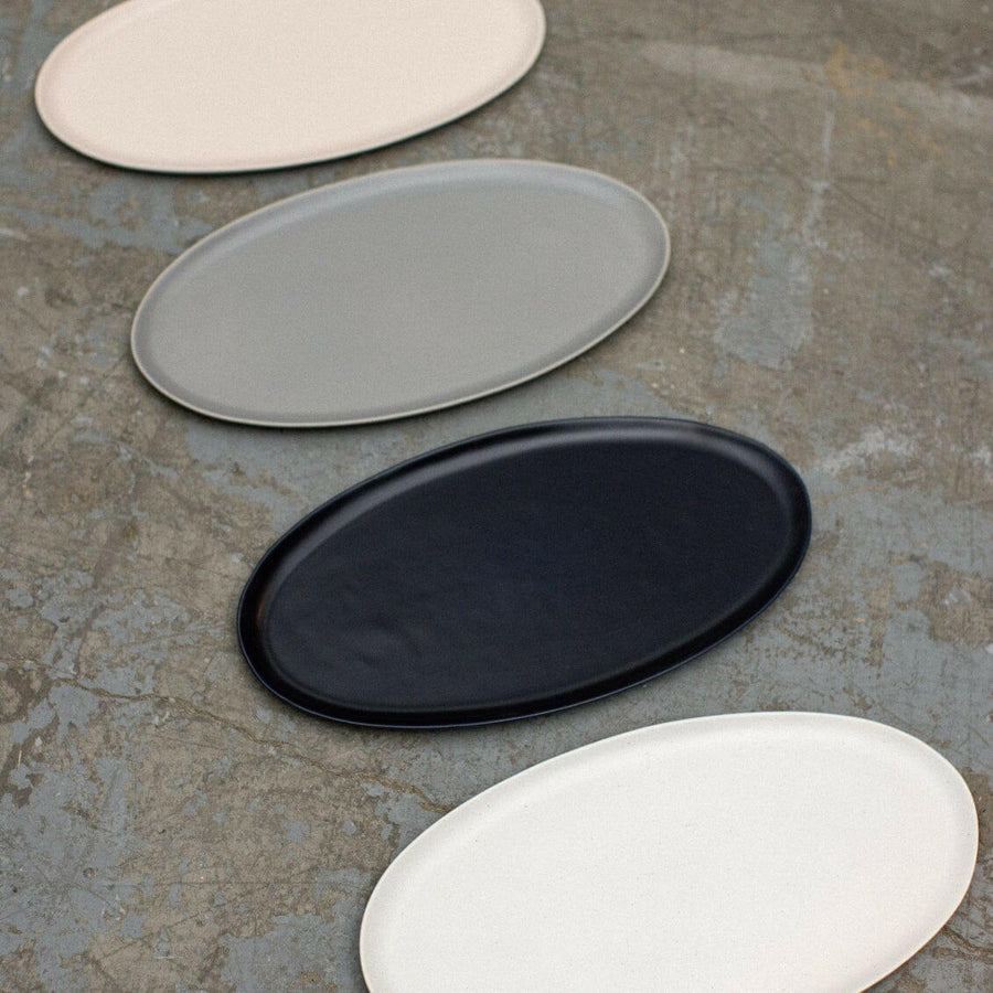 Elegant serving platter showcasing an exquisite arrangement for formal dining occasions, enhancing culinary presentation.
