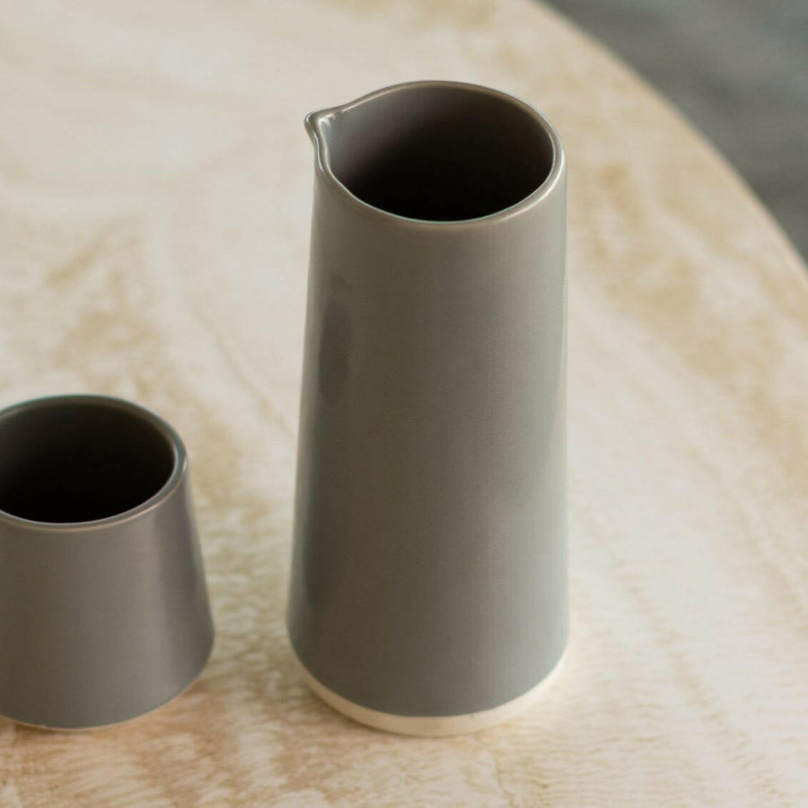Elegant glass carafe filled with fresh water, perfect for dining table settings and enhancing beverage presentation