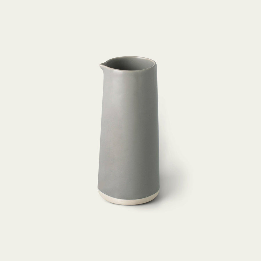 Elegant glass carafe filled with fresh water, perfect for dining table settings and enhancing beverage presentation
