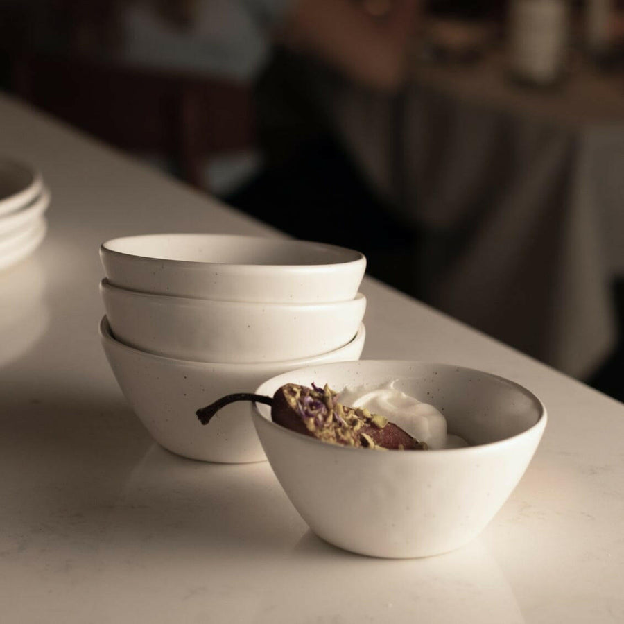 Delicious dessert bowls elegantly presented, featuring a variety of sweet flavors and textures for an exquisite treat.