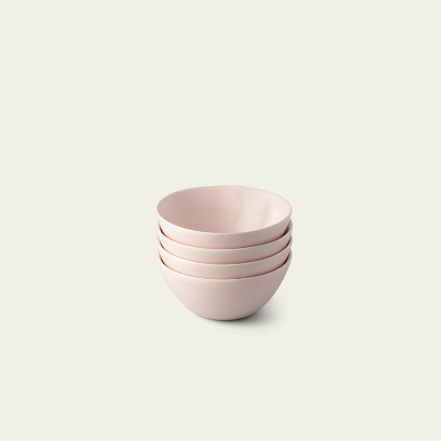 Delicious dessert bowls elegantly presented, featuring a variety of sweet flavors and textures for an exquisite treat.