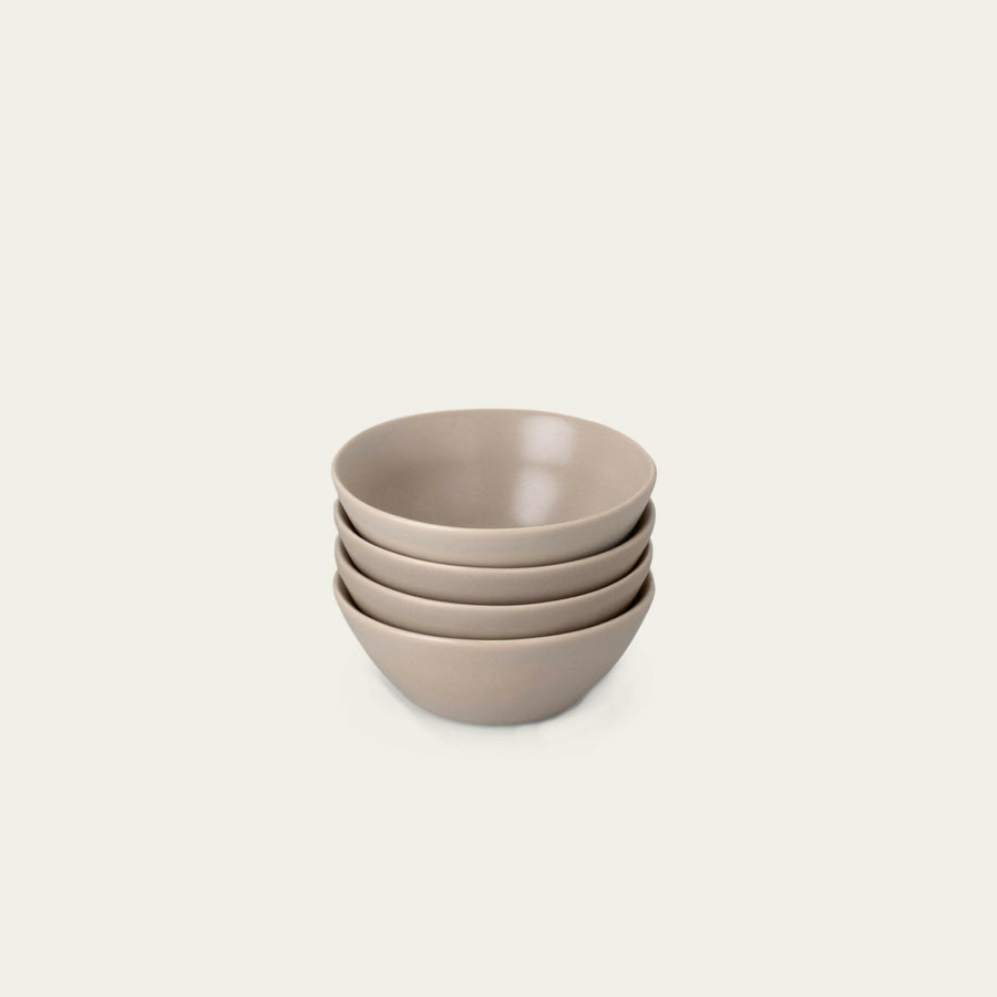 Delicious dessert bowls elegantly presented, featuring a variety of sweet flavors and textures for an exquisite treat.