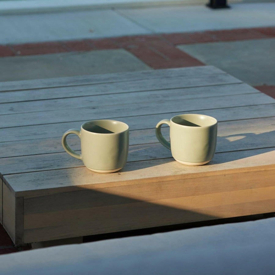 Elegant ceramic mugs perfect for hot beverages, ideal for office and home use with stylish design.