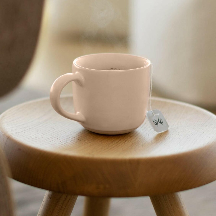 Elegant ceramic mugs perfect for hot beverages, ideal for office and home use with stylish design.