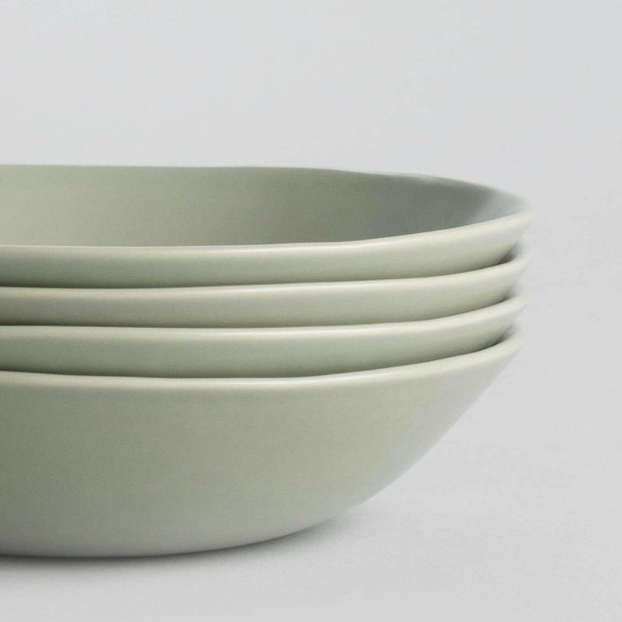 Freshly prepared pasta served in elegant bowls, showcasing authentic Italian cuisine and fine dining presentation