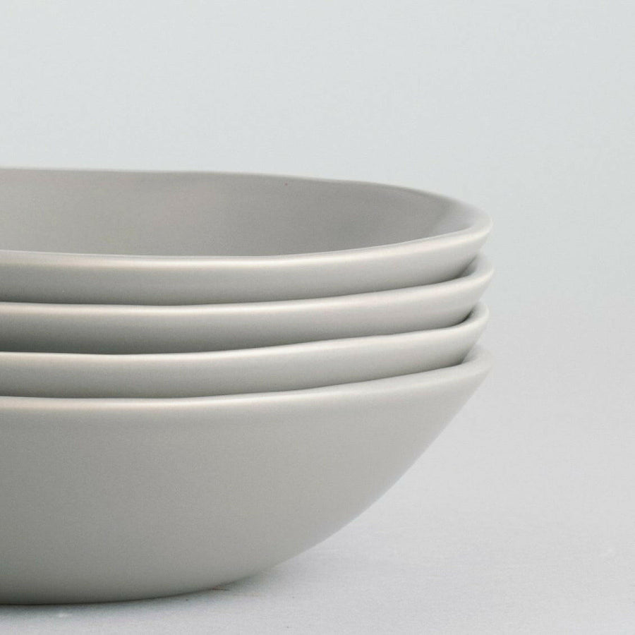 Freshly prepared pasta served in elegant bowls, showcasing authentic Italian cuisine and fine dining presentation