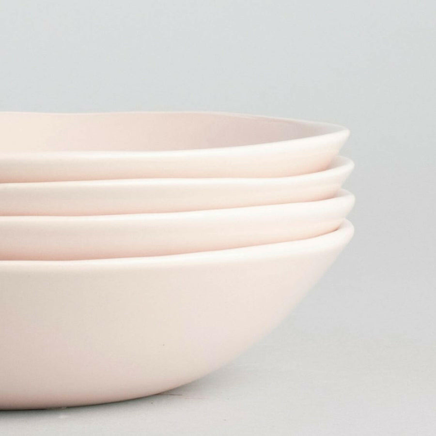 Freshly prepared pasta served in elegant bowls, showcasing authentic Italian cuisine and fine dining presentation