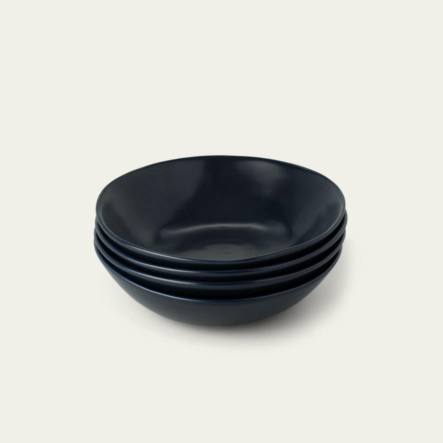 Freshly prepared pasta served in elegant bowls, showcasing authentic Italian cuisine and fine dining presentation