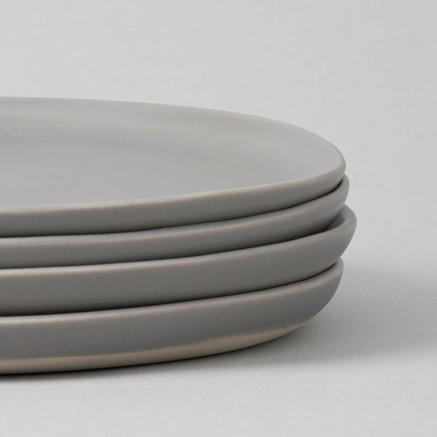 Fresh garden salad served on elegant plates, perfect for a healthy and stylish meal presentation.