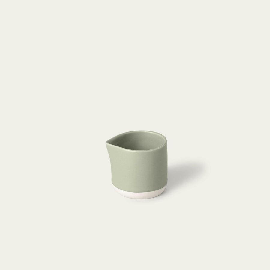 Elegant small carafe for serving beverages, perfect for home or office use enhancing presentation and convenience.