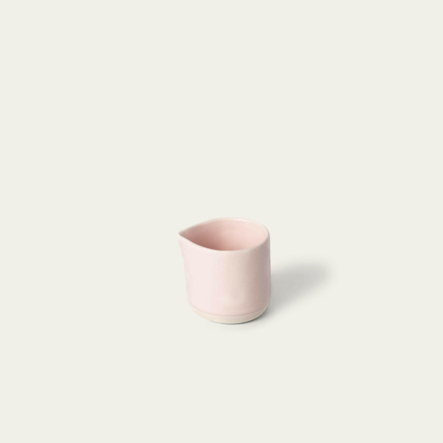 Elegant small carafe for serving beverages, perfect for home or office use enhancing presentation and convenience.