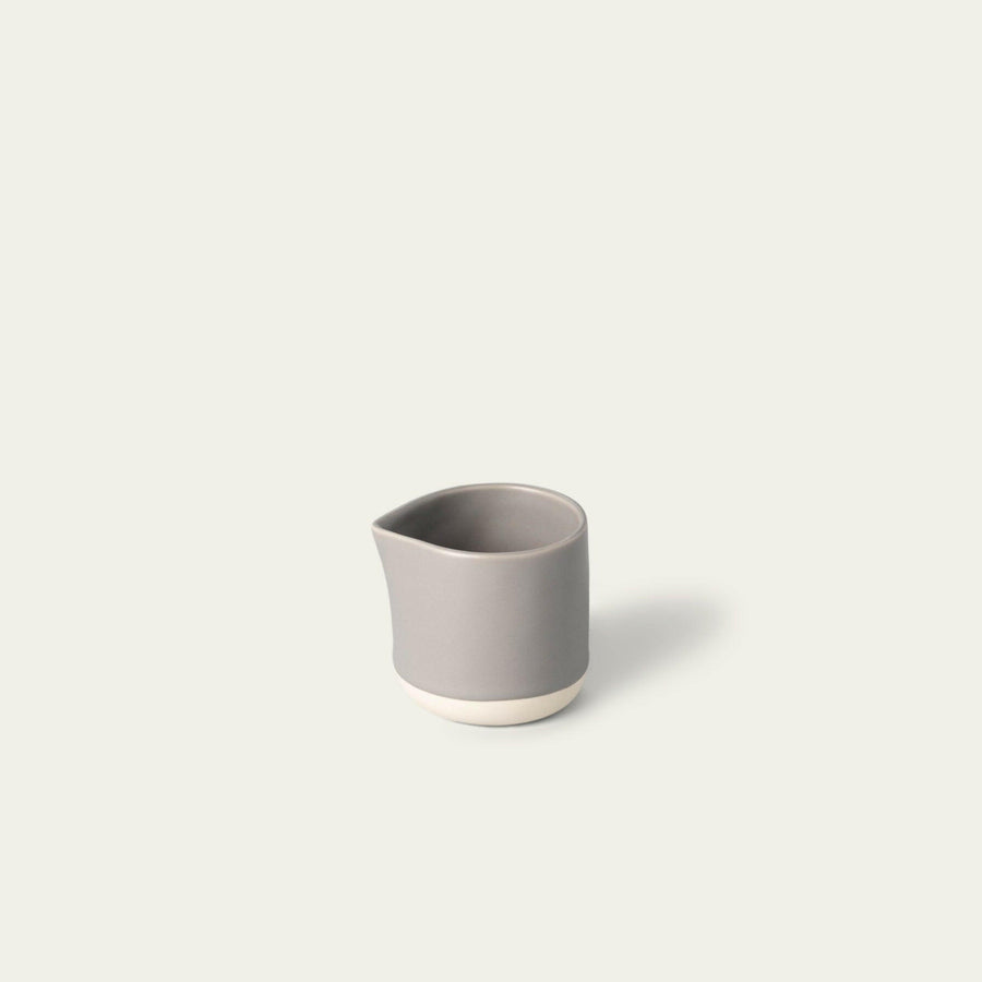 Elegant small carafe for serving beverages, perfect for home or office use enhancing presentation and convenience.