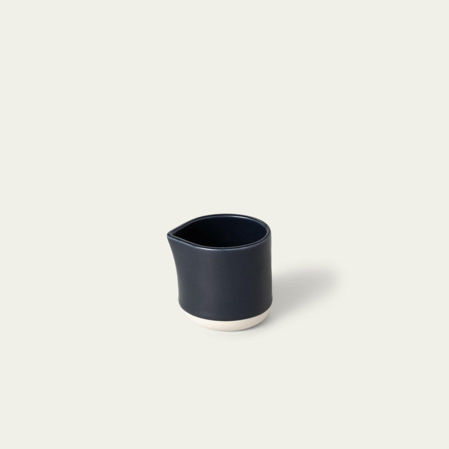 Elegant small carafe for serving beverages, perfect for home or office use enhancing presentation and convenience.